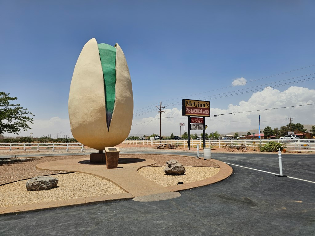 Giant pistachio next to McGinn PistachioLand sign